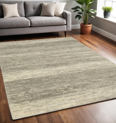 3' X 5' Grey Beige And Tan Abstract Power Loom Stain Resistant Area Rug